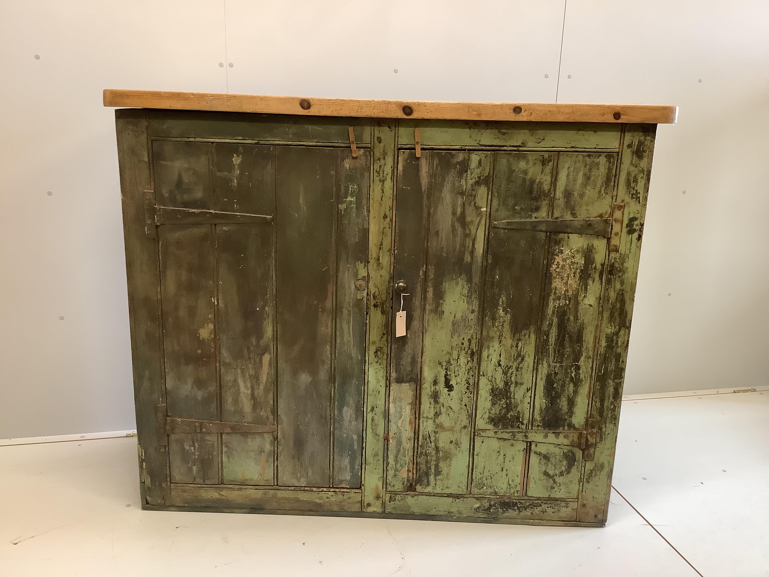 A provincial painted pine two door side cabinet, width 147cm, depth 52cm, height 124cm